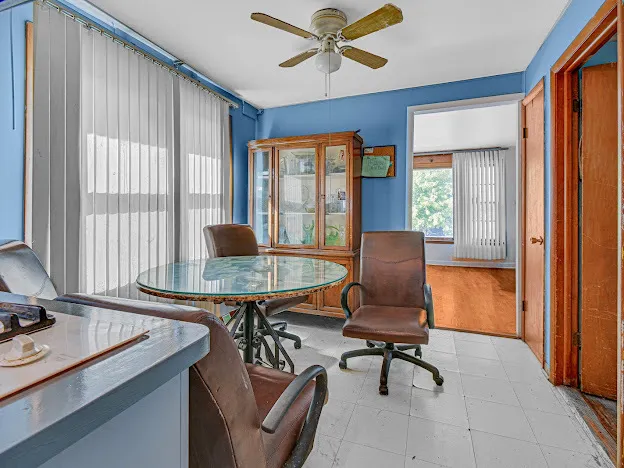 a workspace with furniture and a window