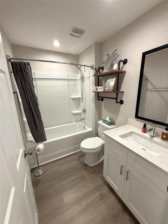 3791 Southwest 166th Pl Road Ocala, FL 34473 - Photo 23 of 43 a bathroom with a sink a toilet and shower