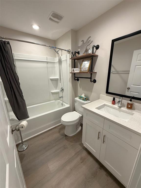 3791 Southwest 166th Pl Road Ocala, FL 34473 - Photo 24 of 43 a bathroom with a double vanity sink toilet mirror and shower