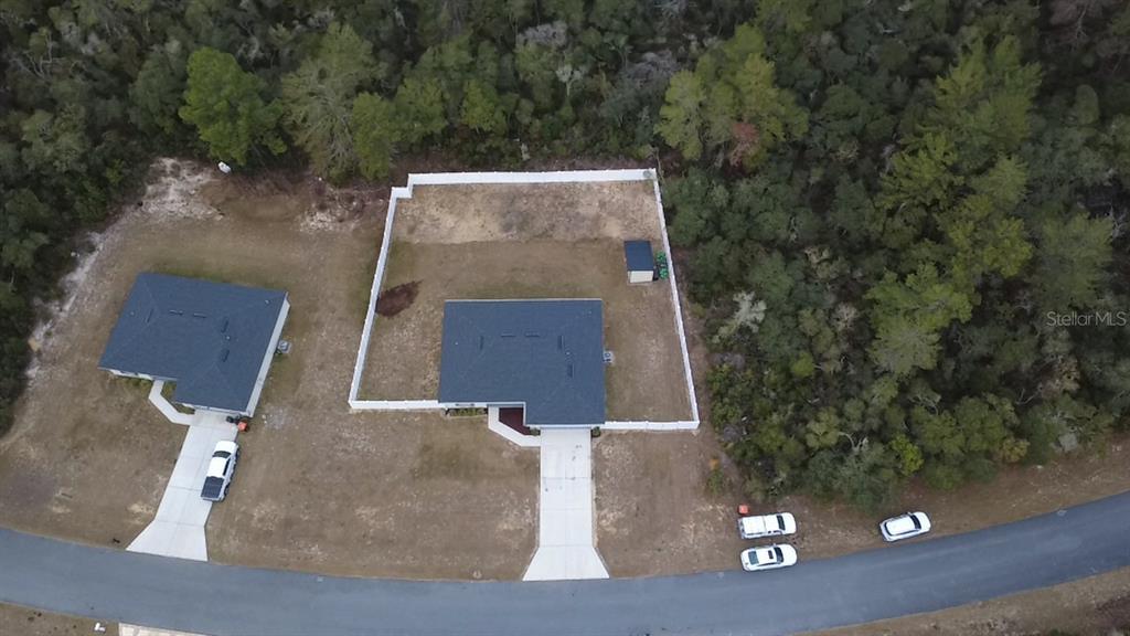 3791 Southwest 166th Pl Road Ocala, FL 34473 - Photo 27 of 43 an aerial view of a house with yard