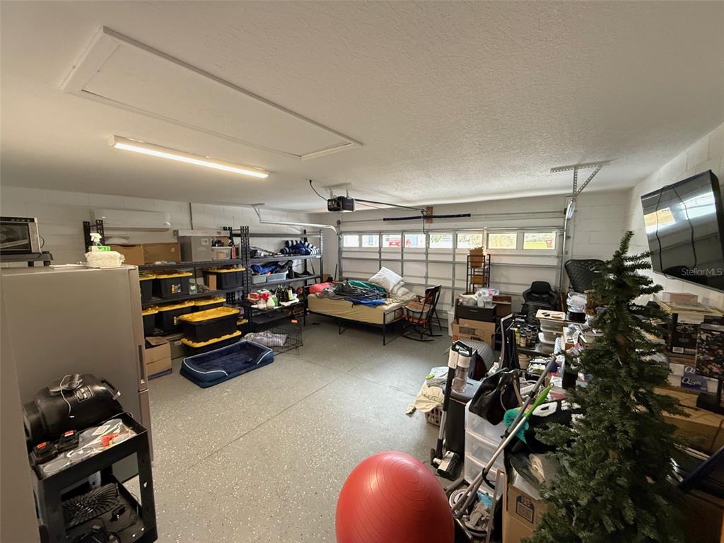 3791 Southwest 166th Pl Road Ocala, FL 34473 - Photo 32 of 43 a gym room with lots of furniture and a wooden floors