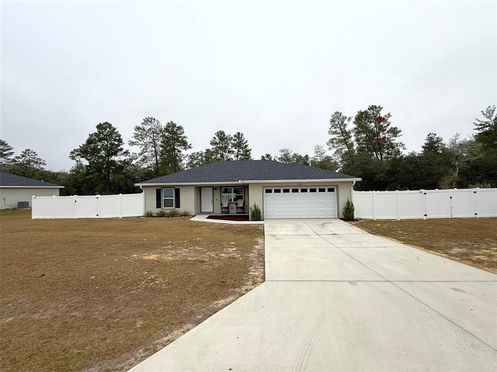 3791 Southwest 166th Pl Road Ocala, FL 34473 - Photo 40 of 43 a view of a house with pool yard and large trees