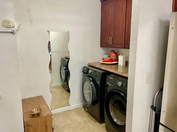 a utility room with dryer and washer