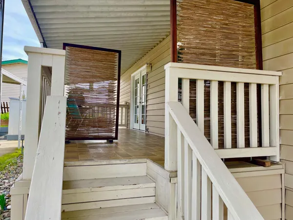 a view of a balcony with door