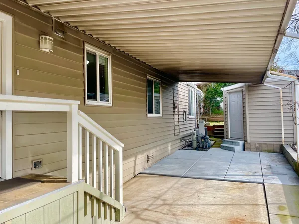 a view of a porch with furniture