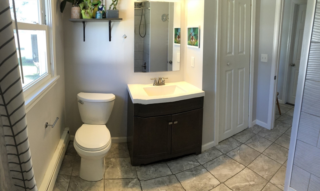61 Southern Road Springfield, MA 01129 - Photo 20 of 35 a bathroom with a sink toilet and shower