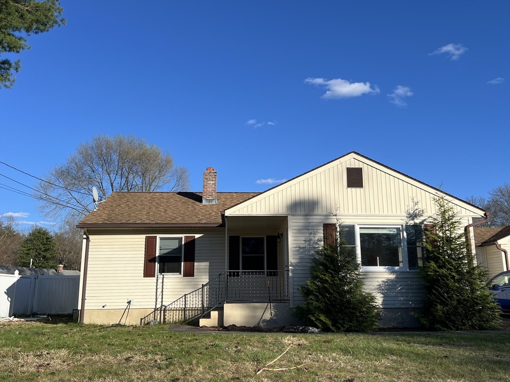61 Southern Road Springfield, MA 01129 - Photo 2 of 35 a front view of a house with garden