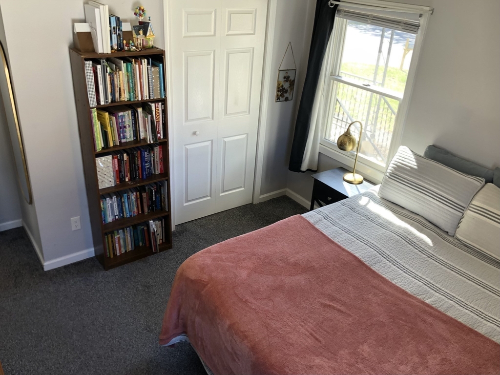 61 Southern Road Springfield, MA 01129 - Photo 24 of 35 a bedroom with a bed furniture and a book shelf