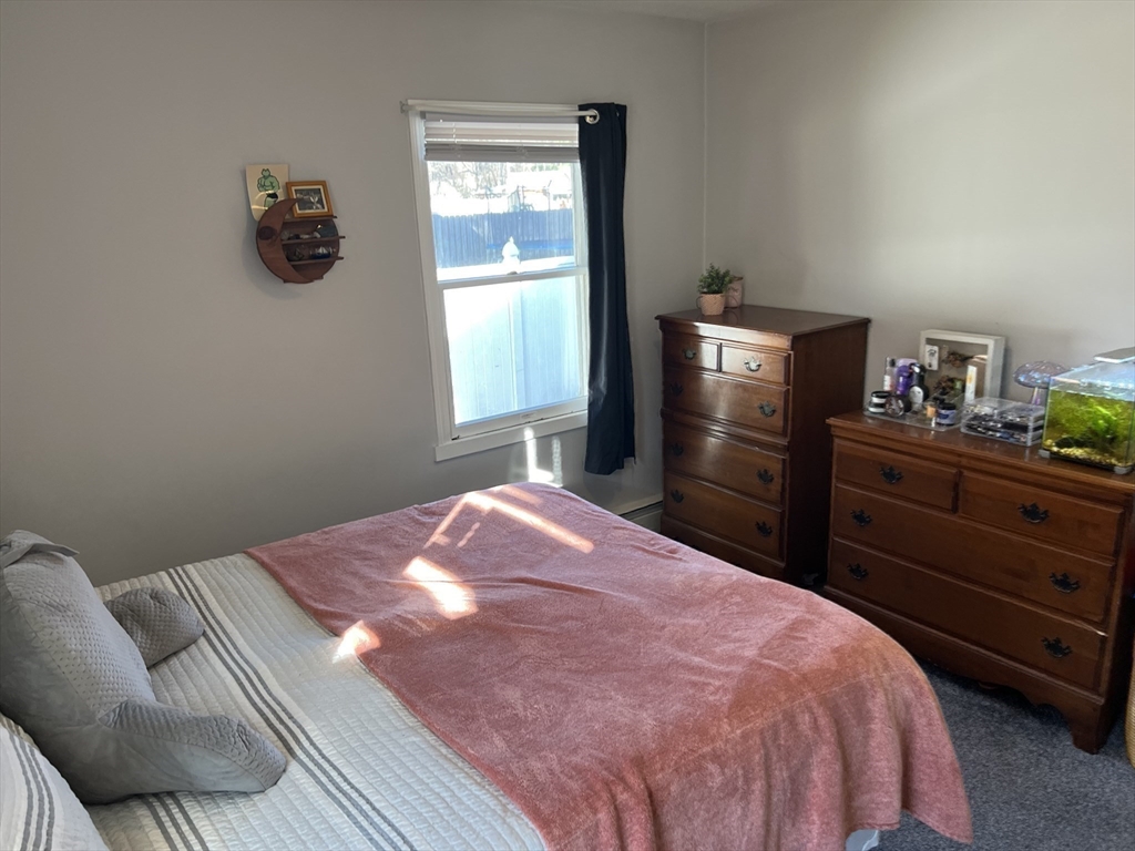 61 Southern Road Springfield, MA 01129 - Photo 25 of 35 a bedroom with a bed and a window