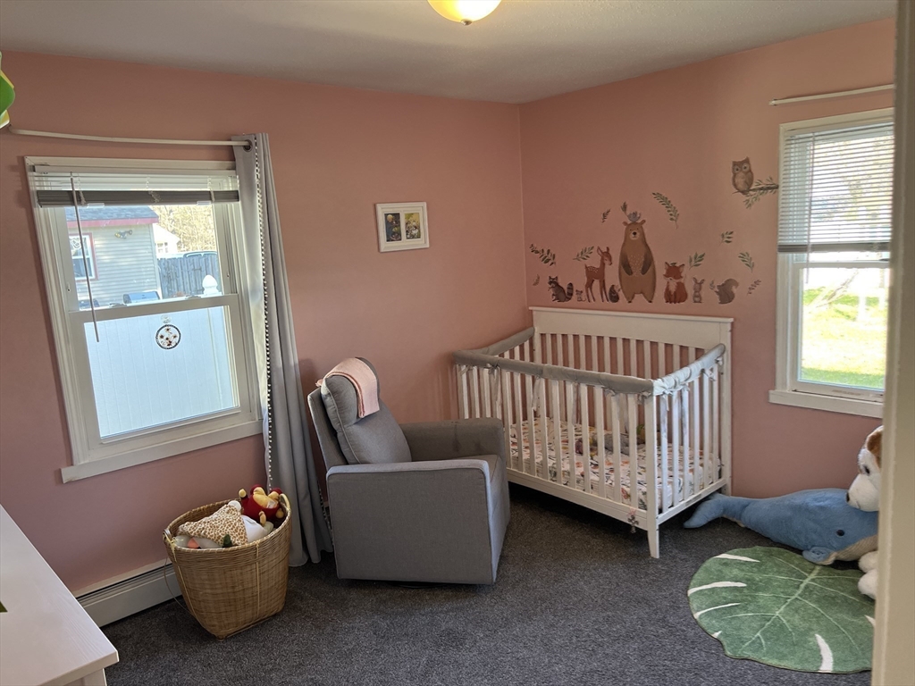 61 Southern Road Springfield, MA 01129 - Photo 27 of 35 a bedroom with a bed and a window