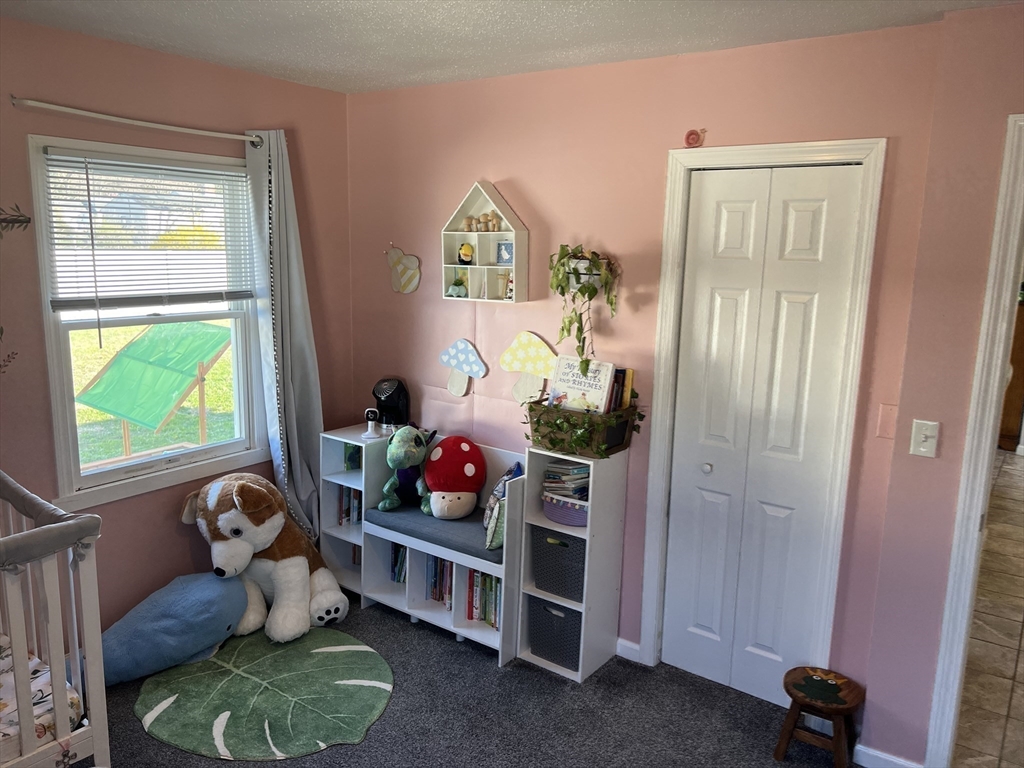 61 Southern Road Springfield, MA 01129 - Photo 28 of 35 a room with toys and a window