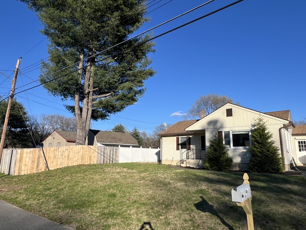 61 Southern Road Springfield, MA 01129 - Photo 3 of 35 a front view of a house with garden
