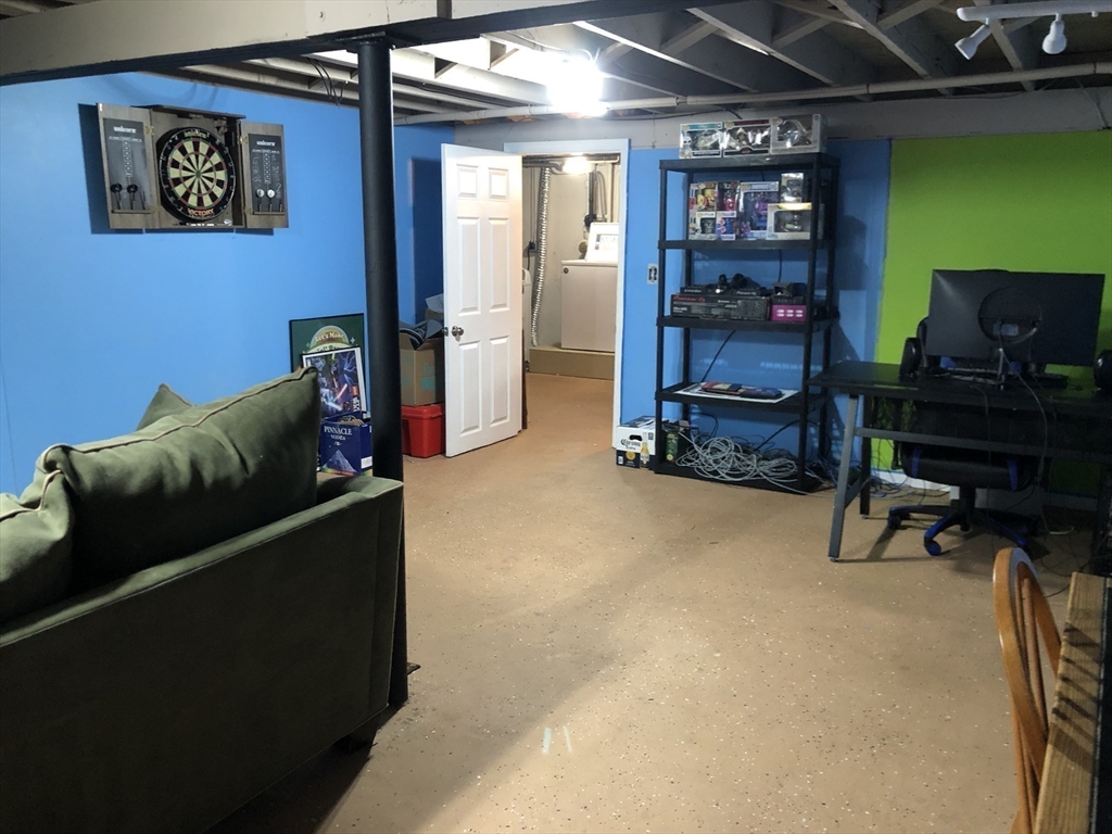 61 Southern Road Springfield, MA 01129 - Photo 34 of 35 a living room with furniture and a flat screen tv