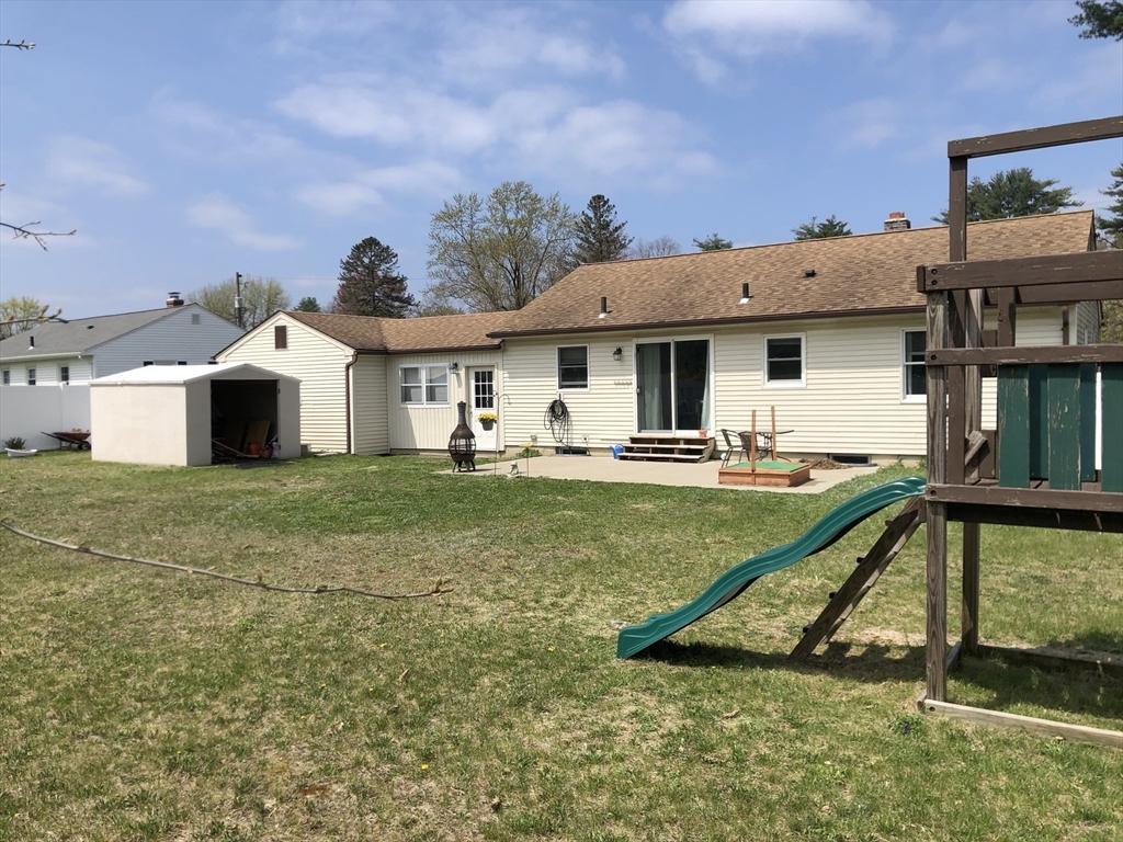 61 Southern Road Springfield, MA 01129 - Photo 8 of 35 a view of a house with pool and chairs