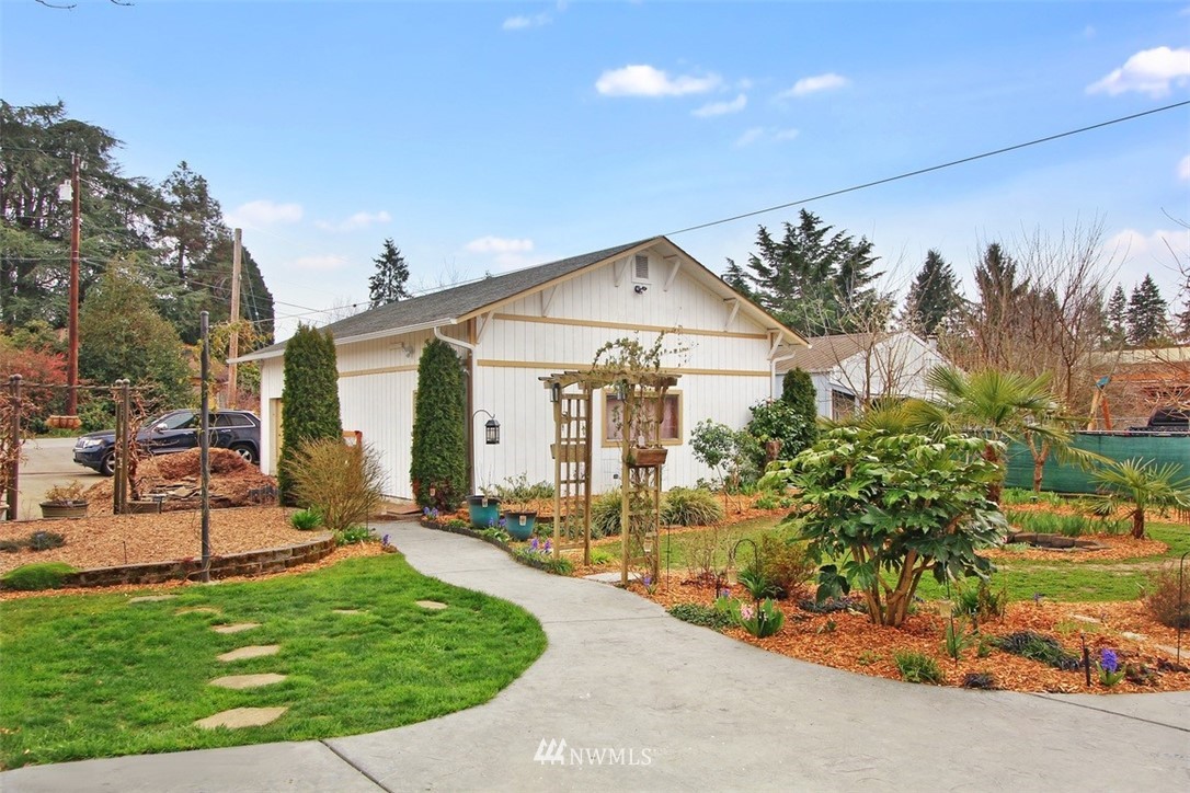 5803 Lowell Road Everett, WA 98203 - Photo 22 of 23 a view of a house with backyard and sitting area