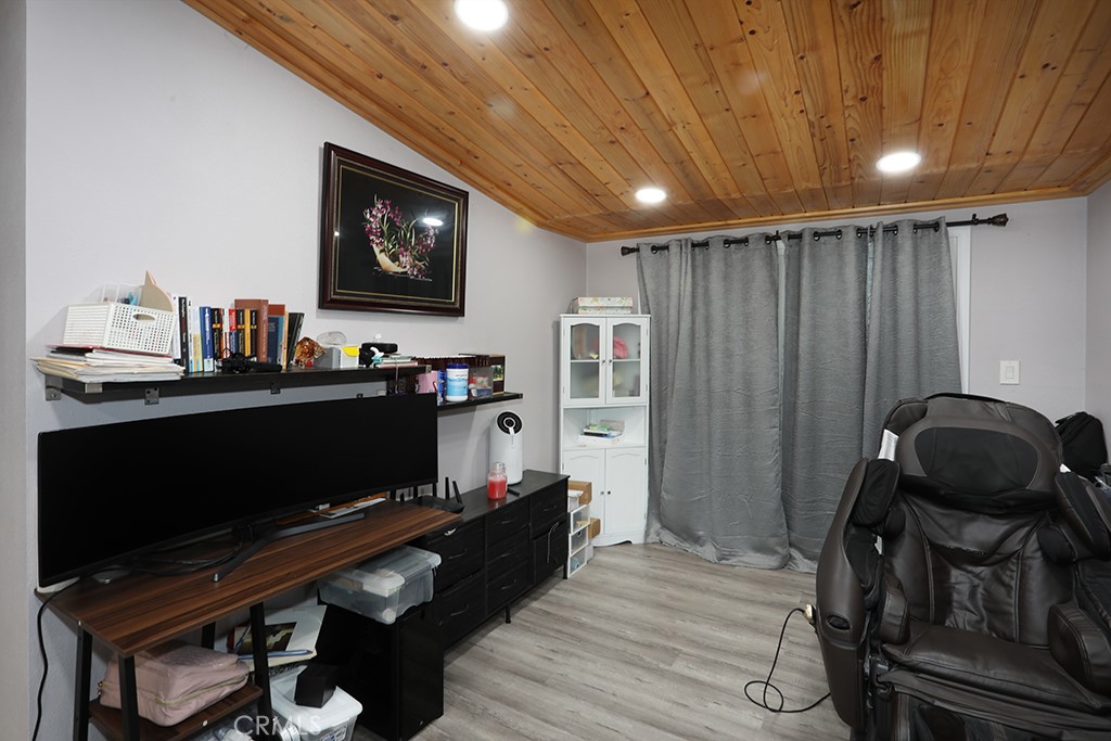 9802 Chanticleer Road Anaheim, CA 92804 - Photo 20 of 31 a living room with furniture and a flat screen tv