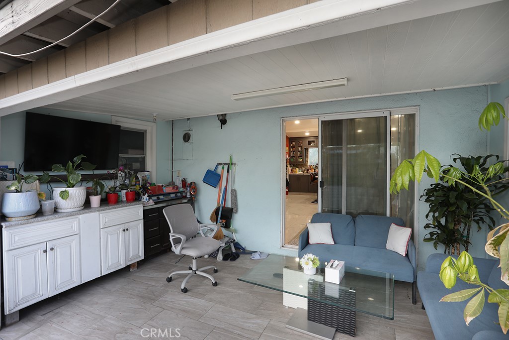 9802 Chanticleer Road Anaheim, CA 92804 - Photo 25 of 31 a view of a livingroom with workspace and a living room