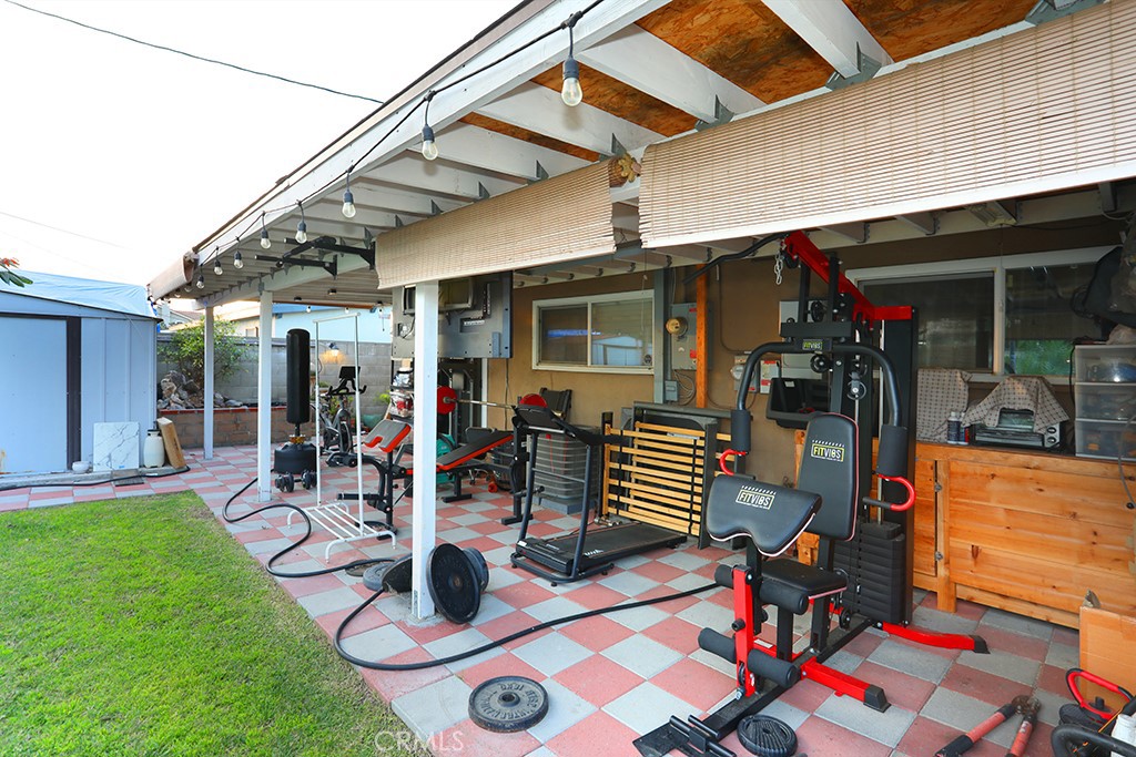 9802 Chanticleer Road Anaheim, CA 92804 - Photo 26 of 31 a outdoor living space with furniture and garden view