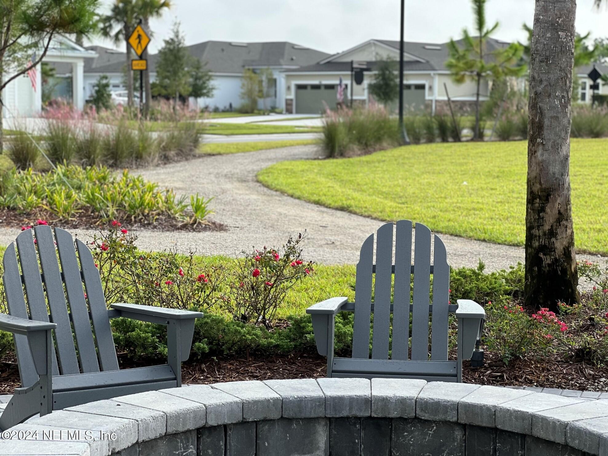 207 Merchant Avenue St. Johns, FL 32259 - Photo 18 of 54 a view of a fountain in front of a house