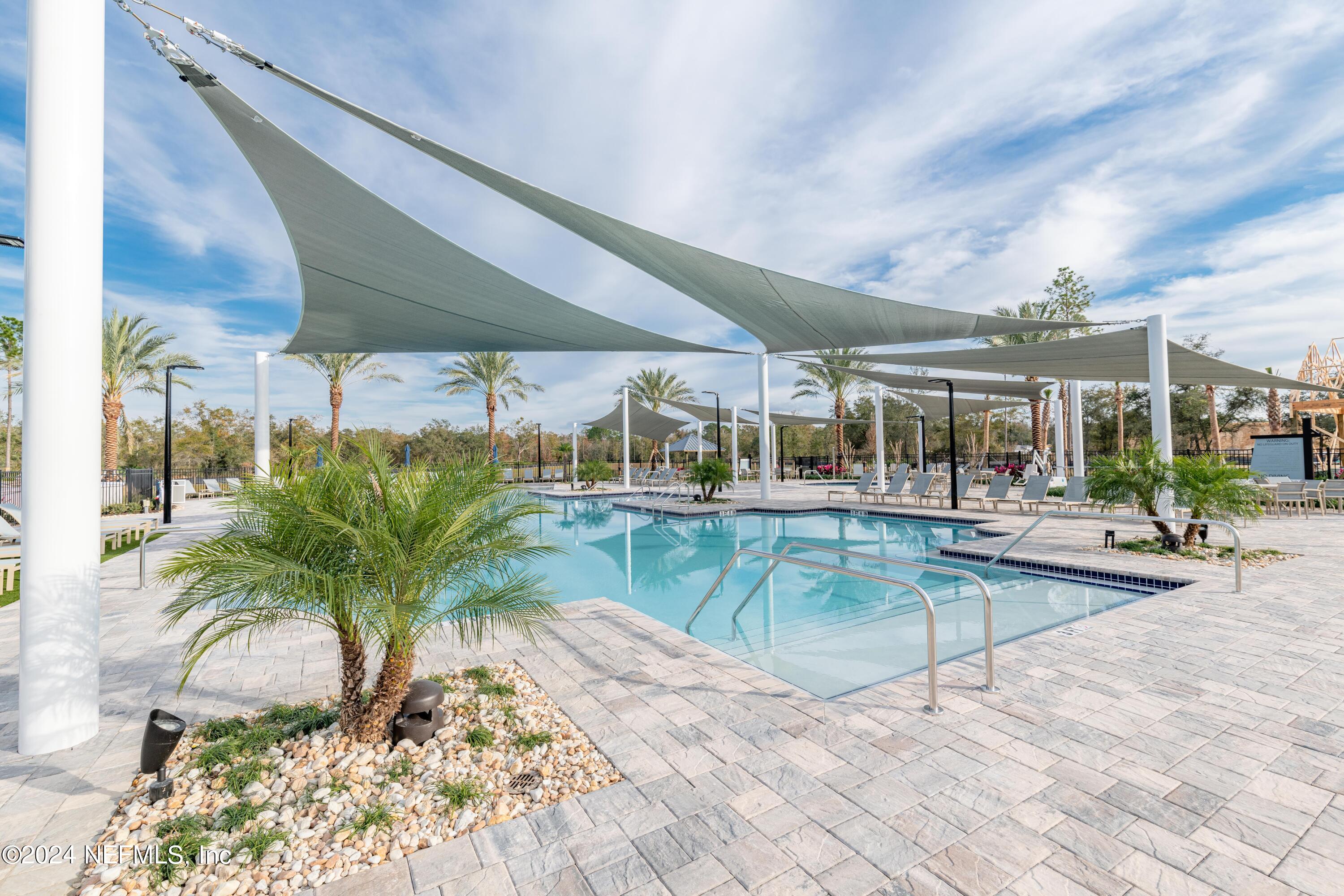 207 Merchant Avenue St. Johns, FL 32259 - Photo 7 of 54 swimming pool view with a seating space