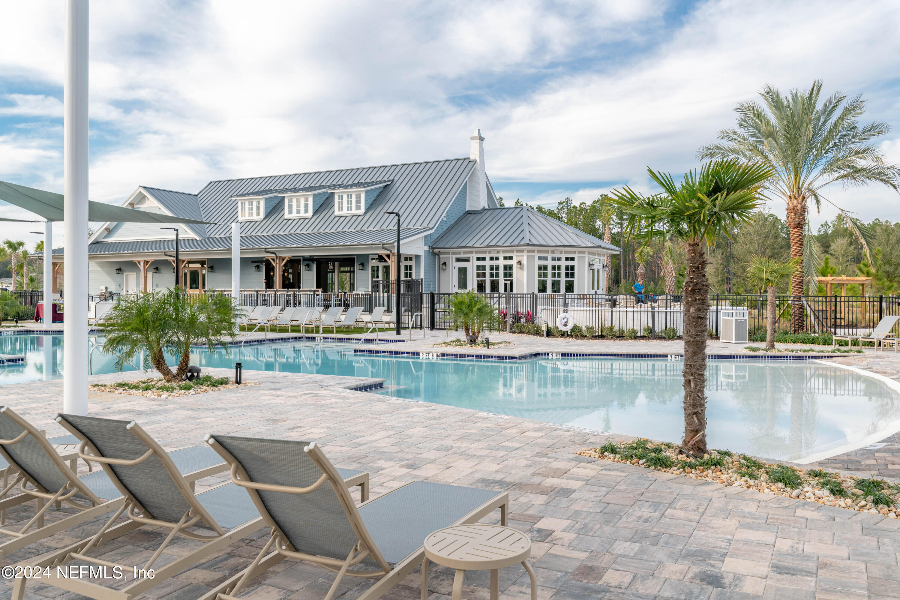 207 Merchant Avenue St. Johns, FL 32259 - Photo 9 of 54 a view of swimming pool with outdoor seating and plants