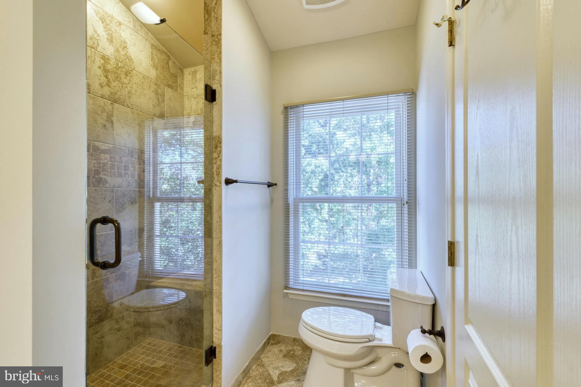 12027 Edgemere Circle Reston, VA 20190 - Photo 21 of 35 MBTH Fully tiled walk-in shower
