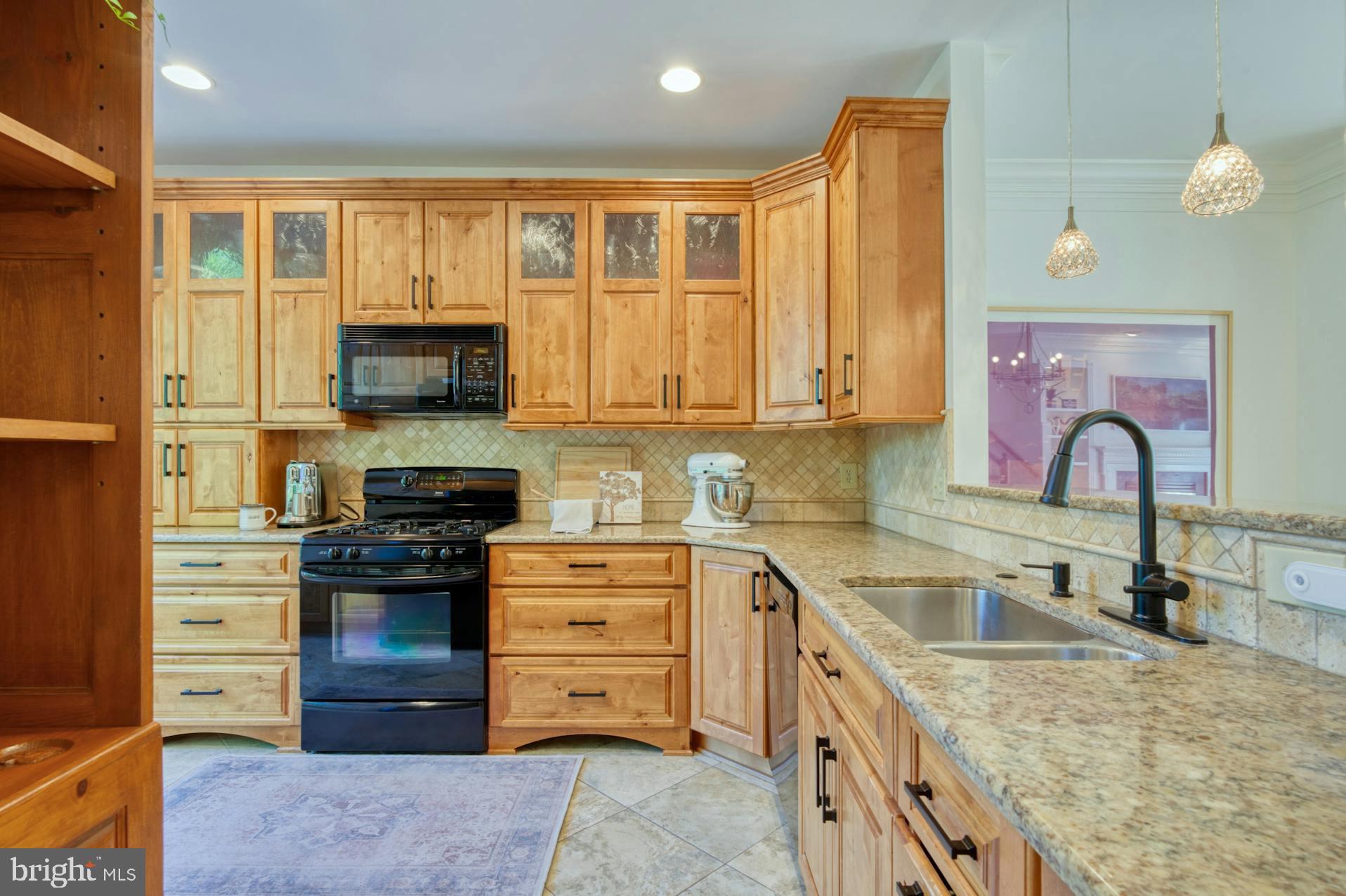 12027 Edgemere Circle Reston, VA 20190 - Photo 6 of 35 KNOTTY ALDER glass -pane lighted cabinetry