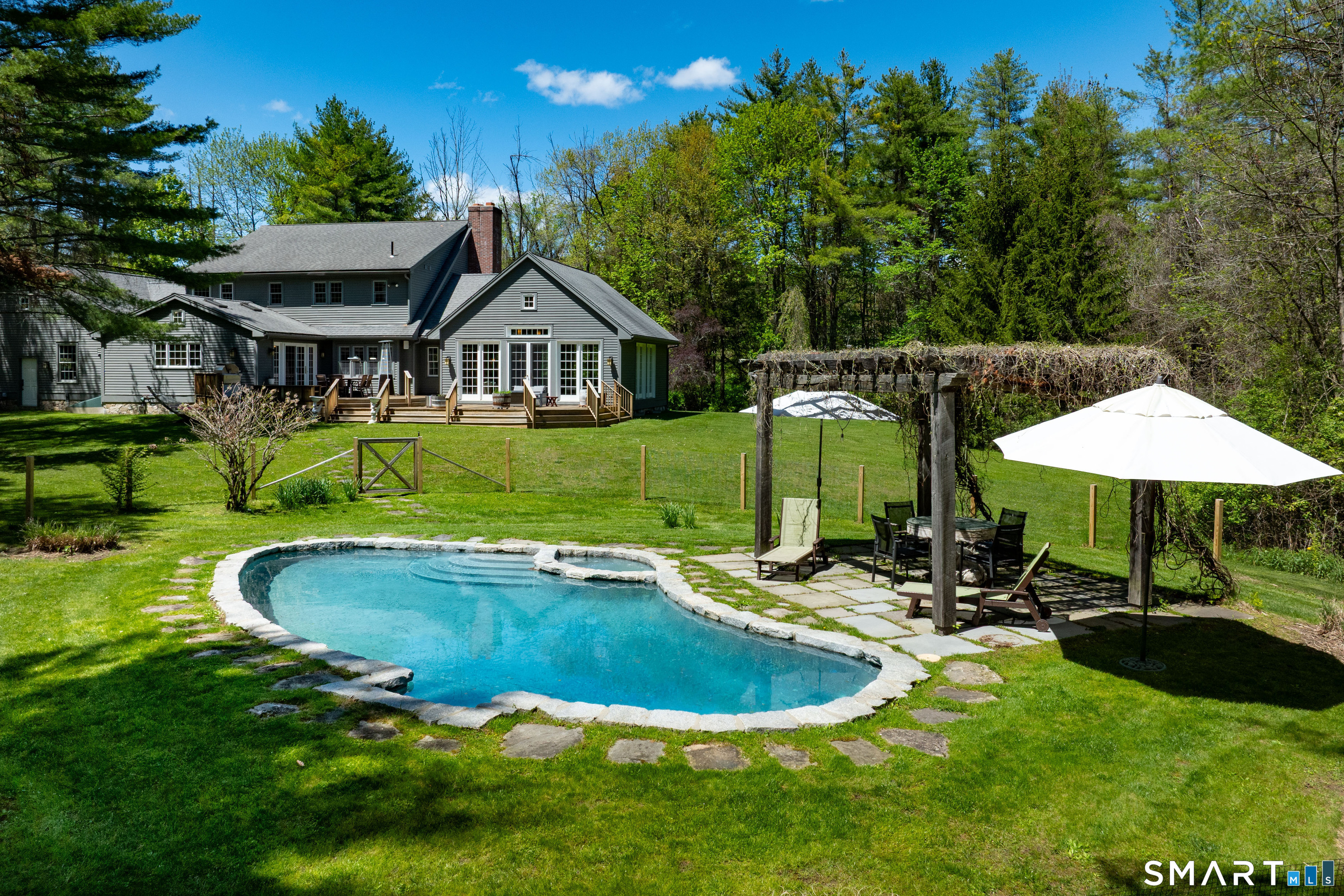 7 Cooper Hill Road Salisbury, CT 06068 - Photo 2 of 36 a view of a house with swimming pool and yard