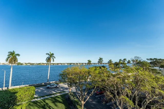 a view of a balcony and yard