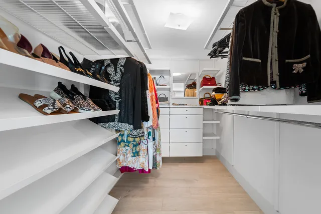 a bathroom with a sink toilet and a mirror