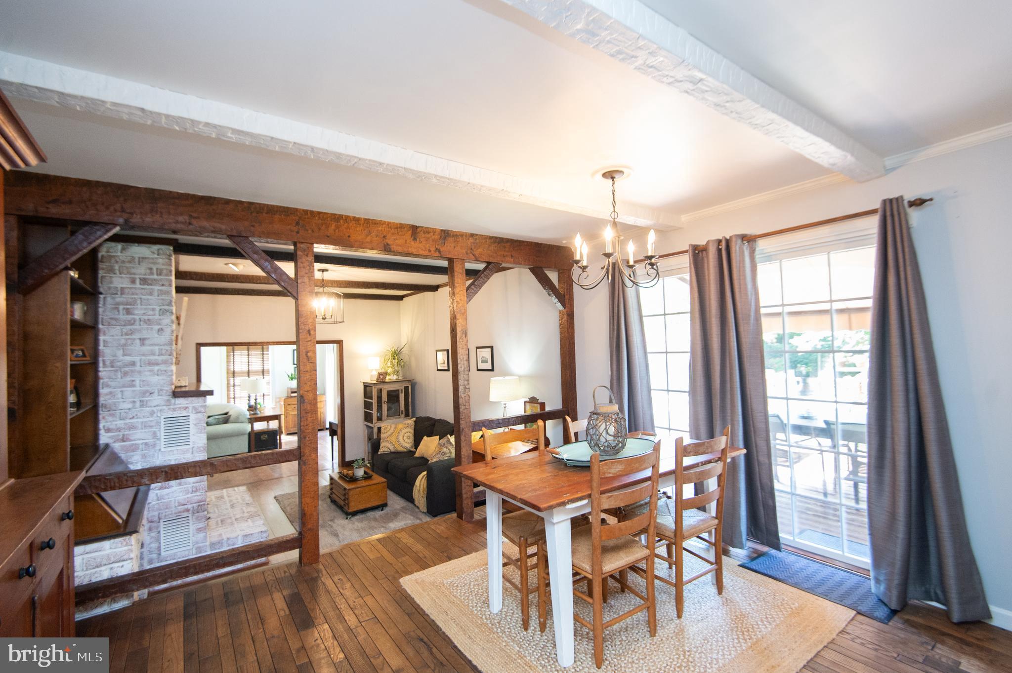 11 Shawnee Road Cambridge, MD 21613 - Photo 20 of 56 a view of a a dining room with furniture window and wooden floor