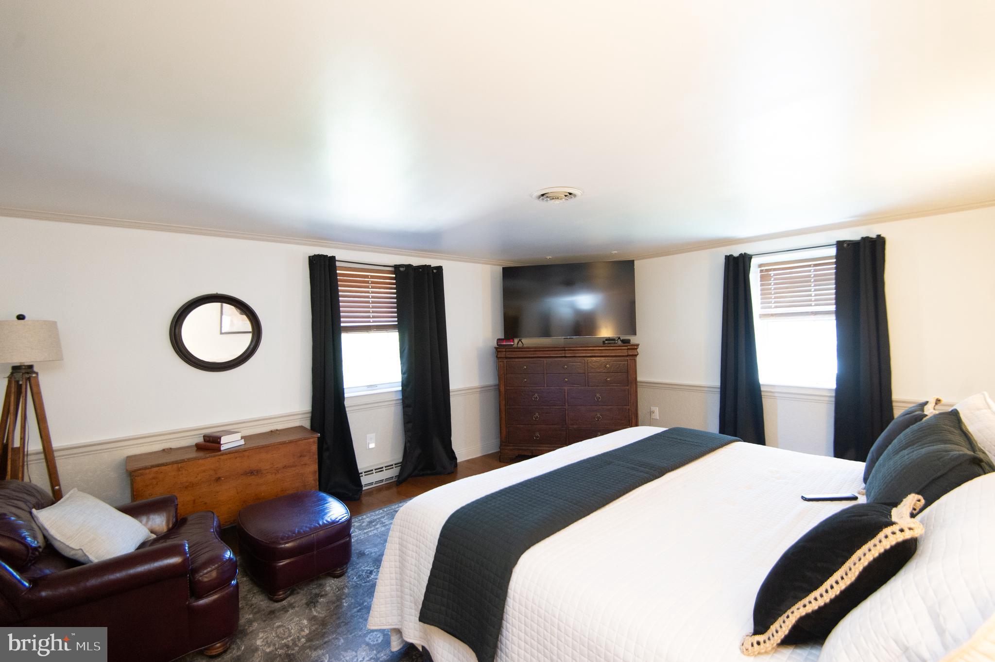 11 Shawnee Road Cambridge, MD 21613 - Photo 30 of 56 a bedroom with a bed and a closet