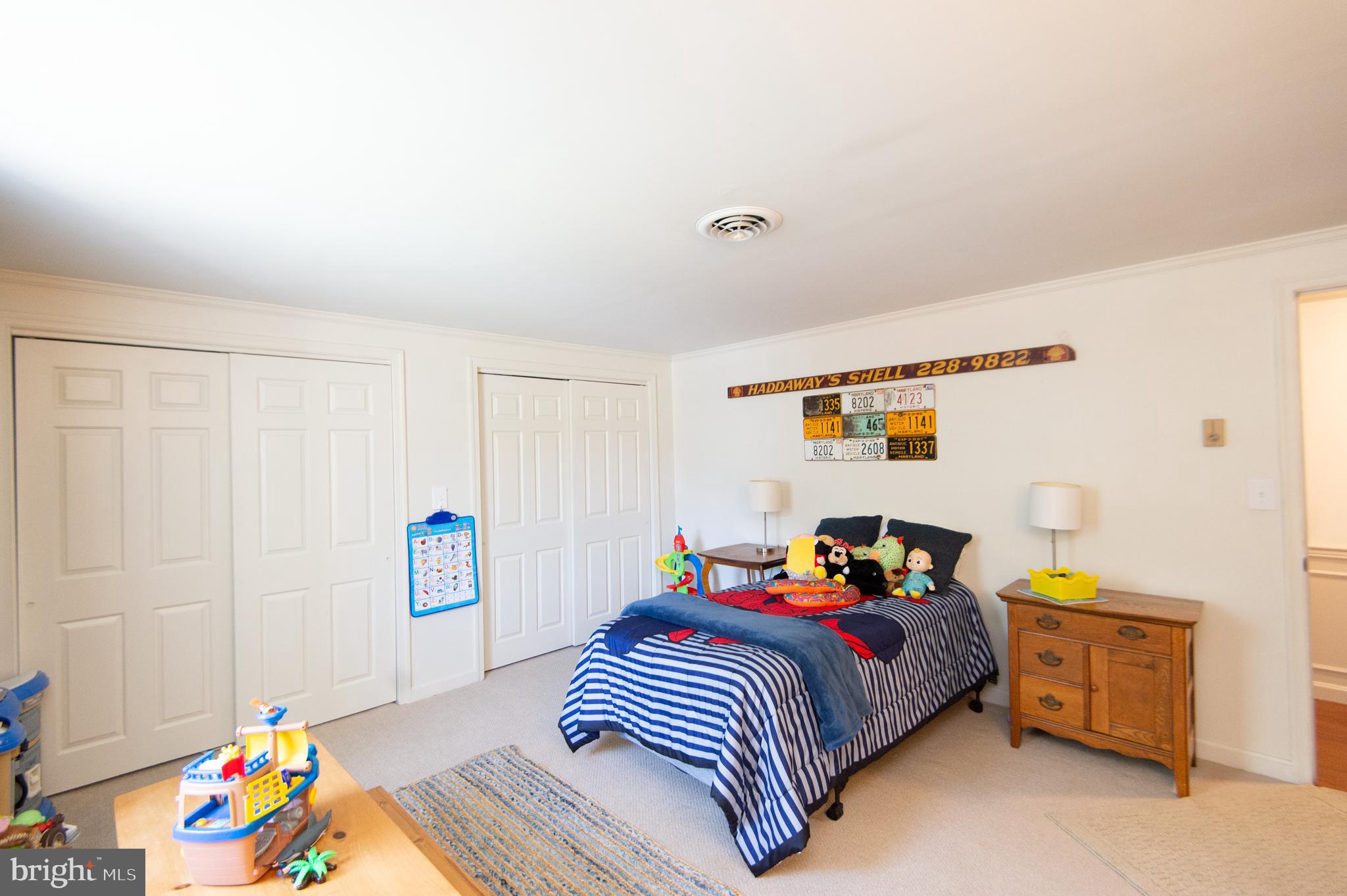 11 Shawnee Road Cambridge, MD 21613 - Photo 38 of 56 a bedroom with a bed and a window