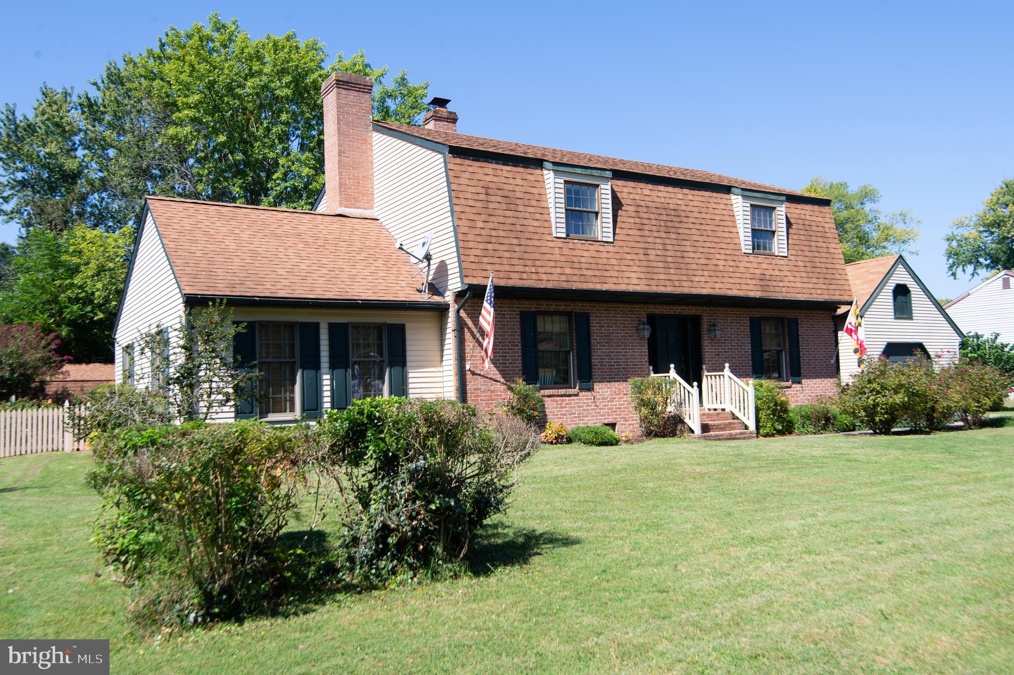 11 Shawnee Road Cambridge, MD 21613 - Photo 51 of 56 a front view of a house with a yard