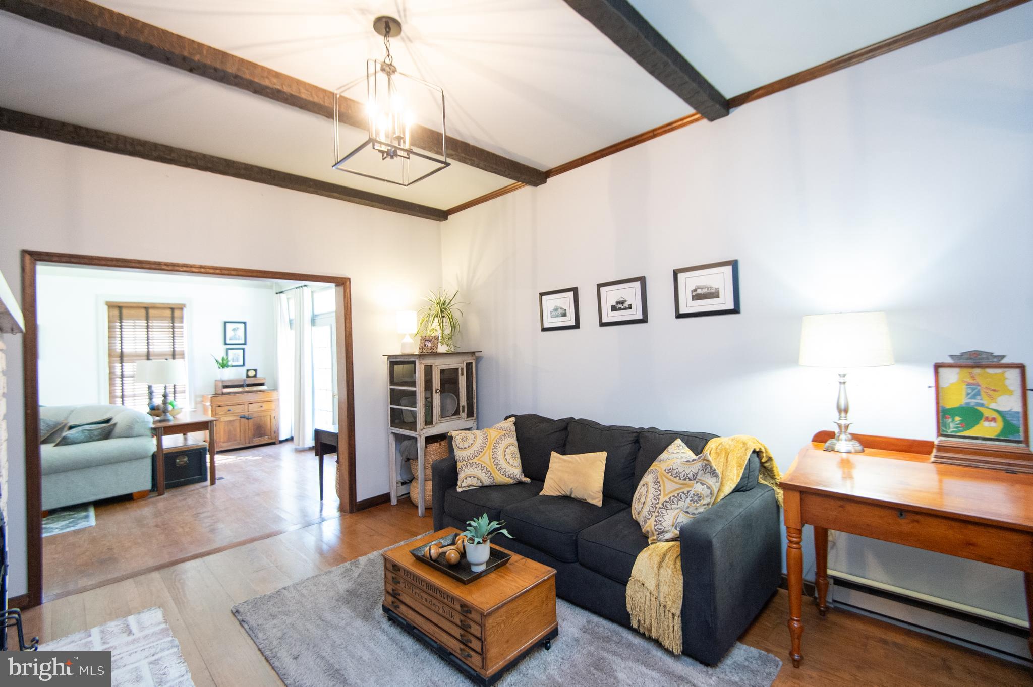 11 Shawnee Road Cambridge, MD 21613 - Photo 10 of 56 a living room with furniture and wooden floor