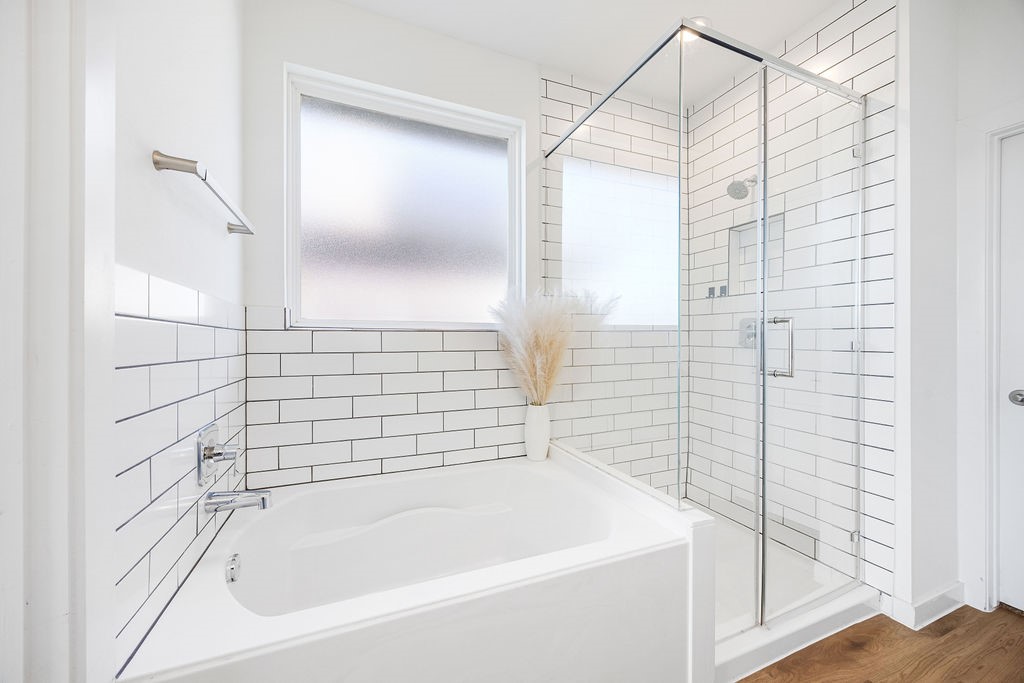 116 Solana Point Drive Katy, TX 77493 - Photo 8 of 31 The primary bedroom offers privacy and relaxation, with dual vanity sinks and a spacious walk-in closet