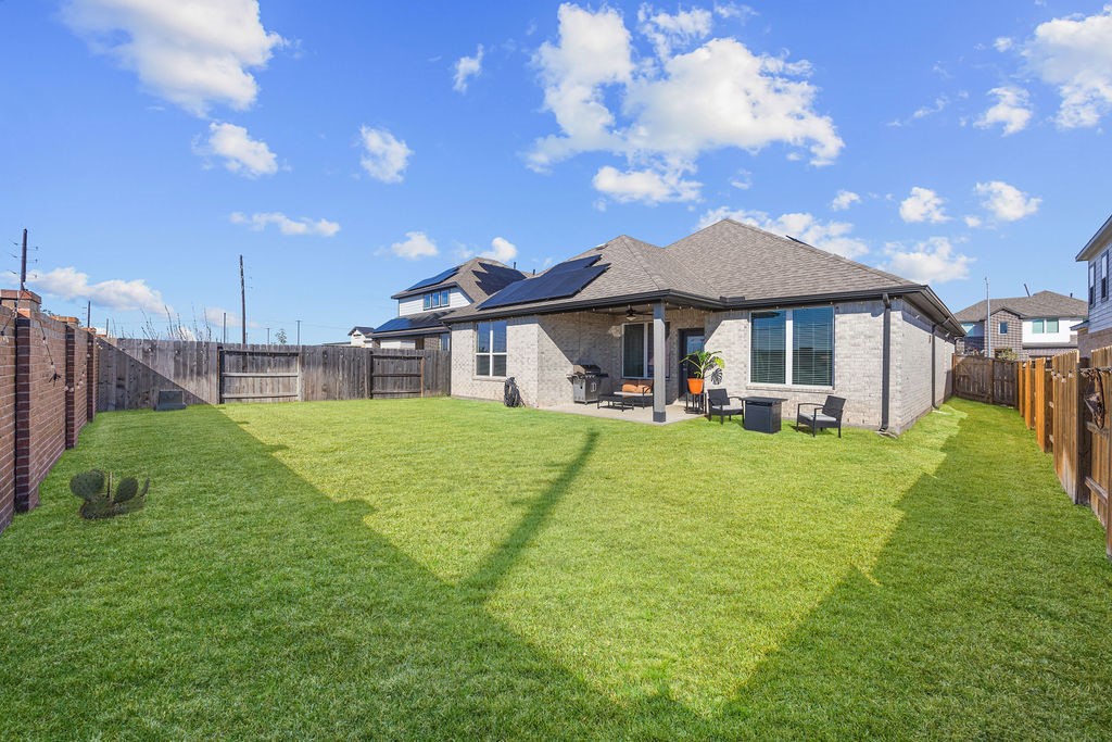 116 Solana Point Drive Katy, TX 77493 - Photo 14 of 31 The home sits on a great lot with no back neighbors and plenty of room to play plus a covered patio designed for relaxation.