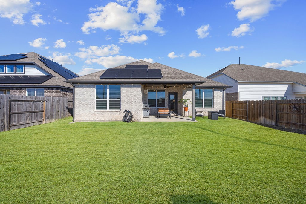 116 Solana Point Drive Katy, TX 77493 - Photo 15 of 31 The home sits on a great lot with no back neighbors and plenty of room to play plus a covered patio designed for relaxation.