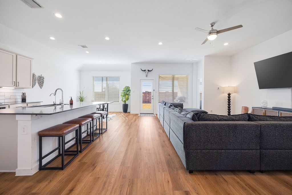 116 Solana Point Drive Katy, TX 77493 - Photo 25 of 31 The home features an open floor plan in the living areas that joins the living room, dining room and kitchen seamlessly, and filled with natural light!