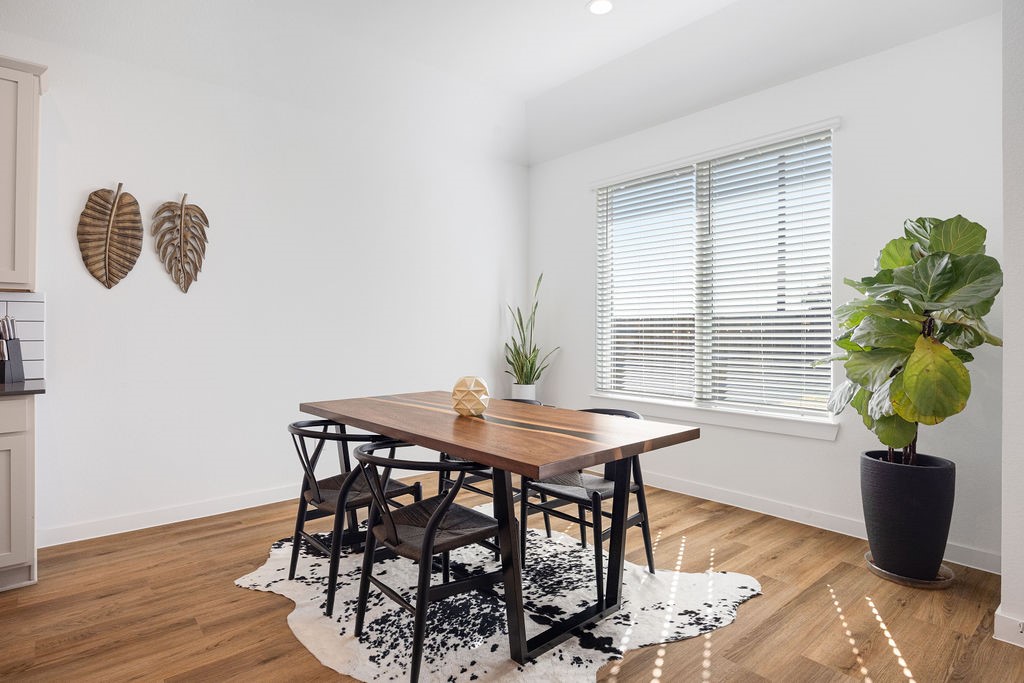 116 Solana Point Drive Katy, TX 77493 - Photo 29 of 31 The open floor plan flows seamlessly from the kitchen to the living room, ideal for the ins and outs of your everyday life.