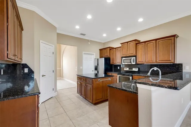 a view of living room with furniture and a window