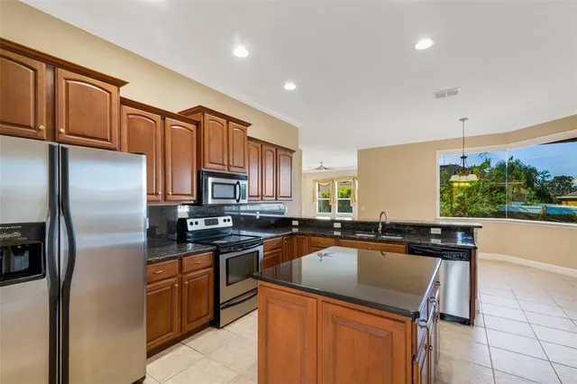 a view of a room with furniture and balcony