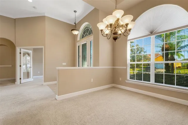 a view of a room with sliding door and wooden floor