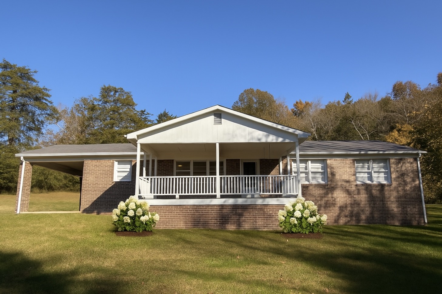 355 Chicken Creek Road Pulaski, TN 38478 - Photo 1 of 17 a front view of a house with a garden
