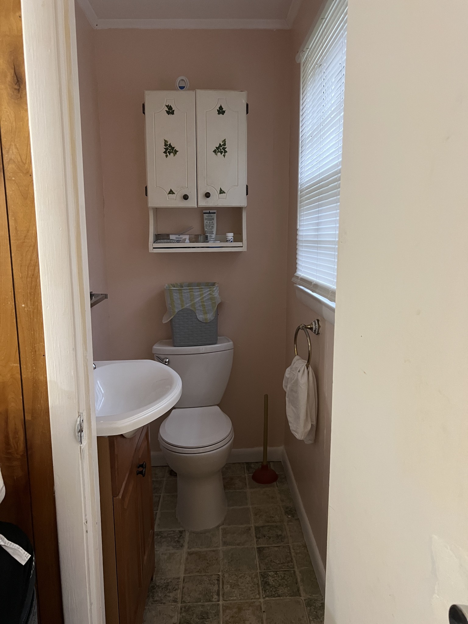 355 Chicken Creek Road Pulaski, TN 38478 - Photo 17 of 17 a white toilet sitting next to a bathroom sink