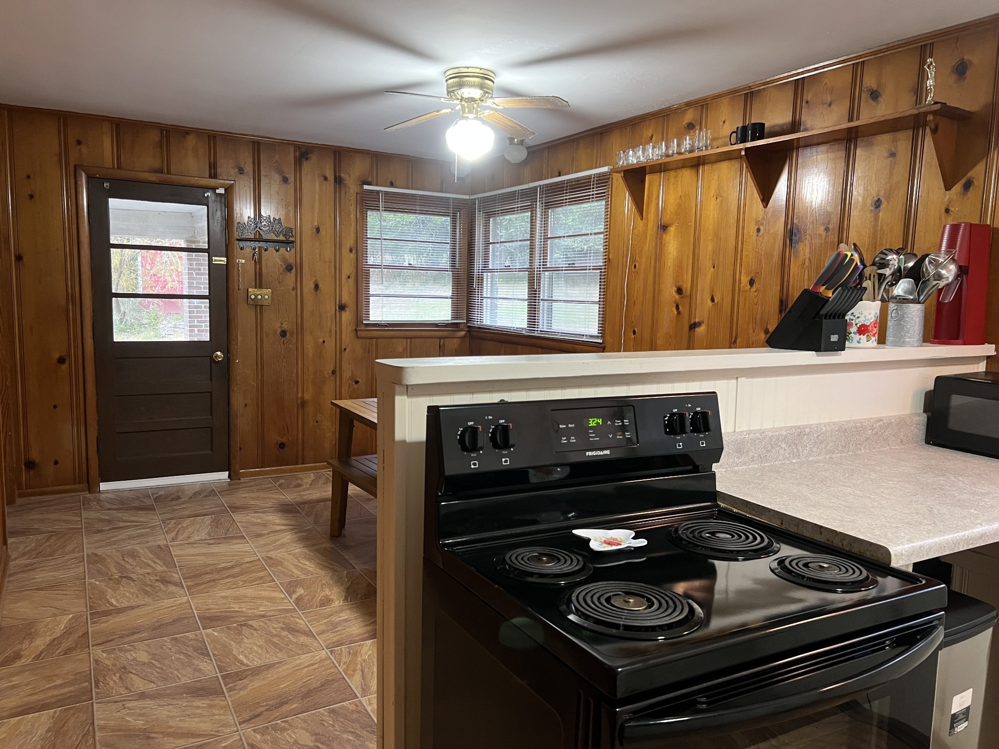 355 Chicken Creek Road Pulaski, TN 38478 - Photo 10 of 17 a stove top oven sitting inside of a kitchen