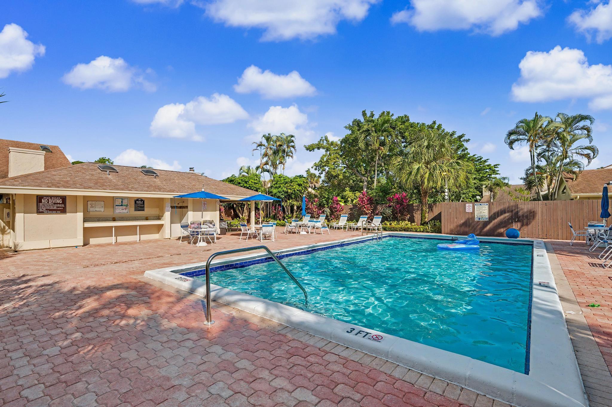 7855 Stanway Place Boca Raton, FL 33433 - Photo 23 of 24 a view of a house with backyard and a tree