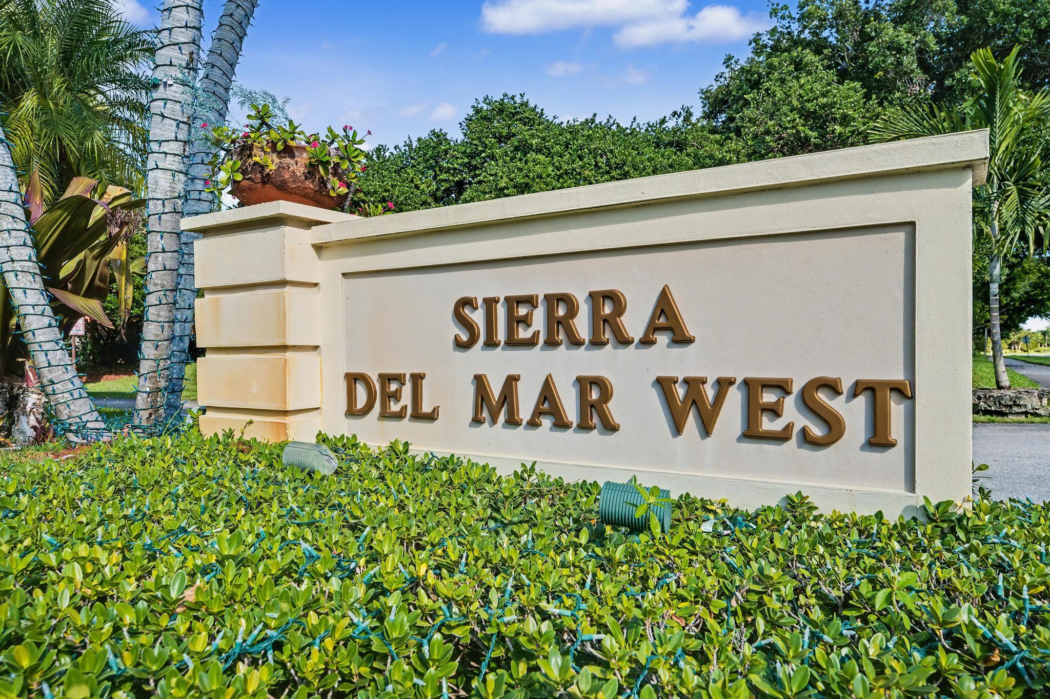 7855 Stanway Place Boca Raton, FL 33433 - Photo 24 of 24 a sign on the side of a building
