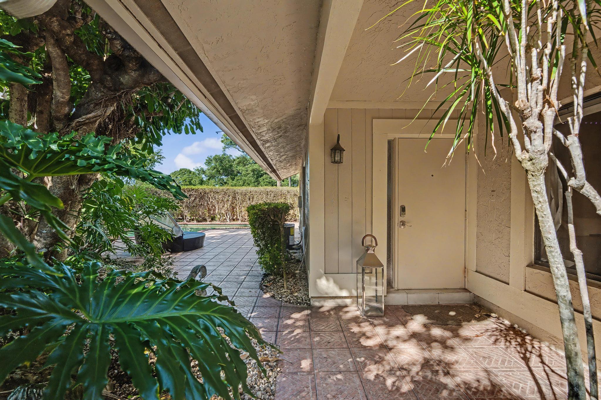 7855 Stanway Place Boca Raton, FL 33433 - Photo 3 of 24 a view of a backyard