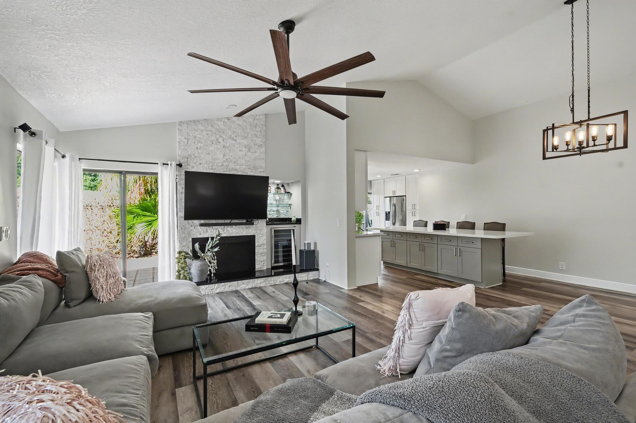 7855 Stanway Place Boca Raton, FL 33433 - Photo 8 of 24 a living room with furniture and a flat screen tv
